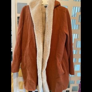 Cardigan sweater with fur inside